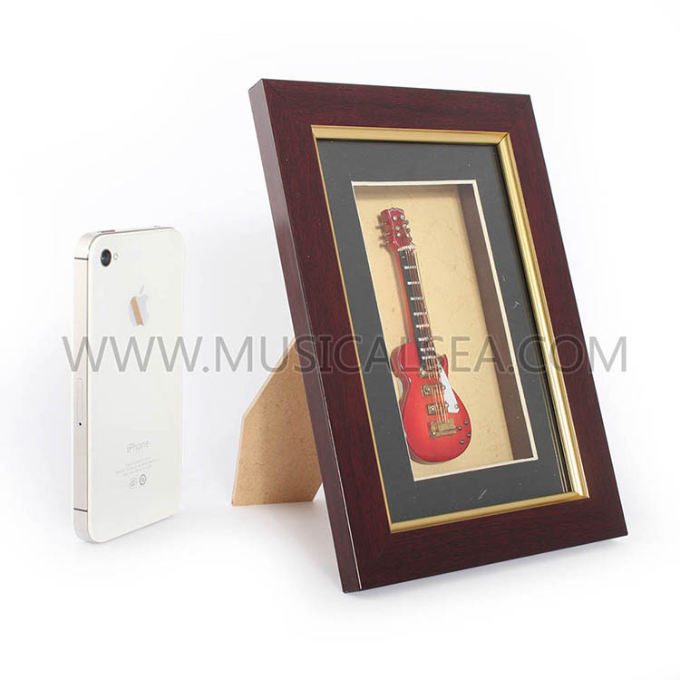 Decorative picture frame with mini electric g